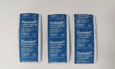 Three blue Fumasil medicine blister packs lined up on a white surface