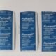 Three blue Fumasil medicine blister packs lined up on a white surface