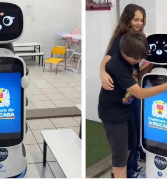 Robot Kratos with touchscreen displaying Prefeitura de Sorocaba logo standing in a classroom setting