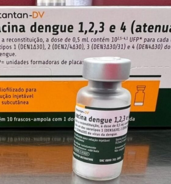 Box of dengue vaccine Butantan DV with a small vial in front Portuguese labeling on both box and vial