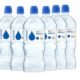 Six  liter plastic water bottles with blue caps arranged in a row label shows a blue droplet and crystal