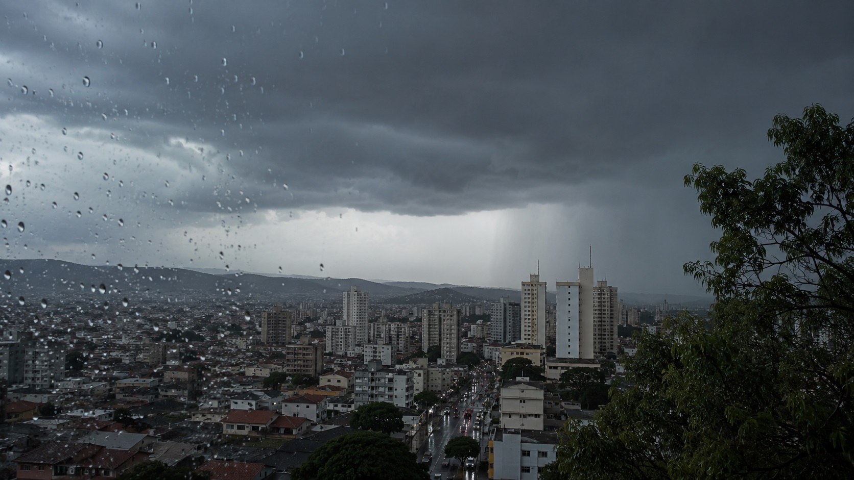 City skyline under dark storm clouds raindrops on a window fill the foreground