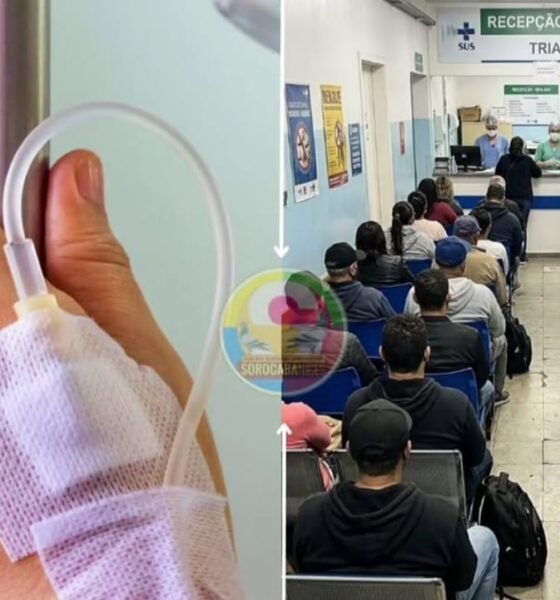 Closeup of a patients hand with an IV line and bandage next to a busy clinic waiting room and reception desk on the right