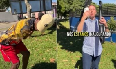 Split screen scene left shows a man in a yellow shirt and cap bending forward near grass right shows a man in a striped shirt holding a long black object with text NOS ESTAMOS INAGURANDO on screen